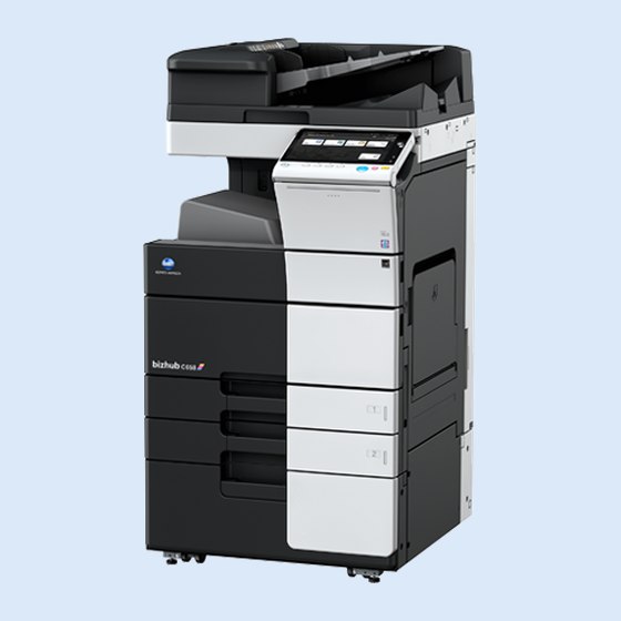 A Konica Minolta bizhub C658 colour multifunction copier with its finishing unit and paper drawers.